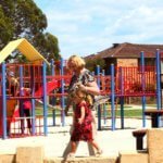 Villas adjacent to children's playground at St Ives Melville