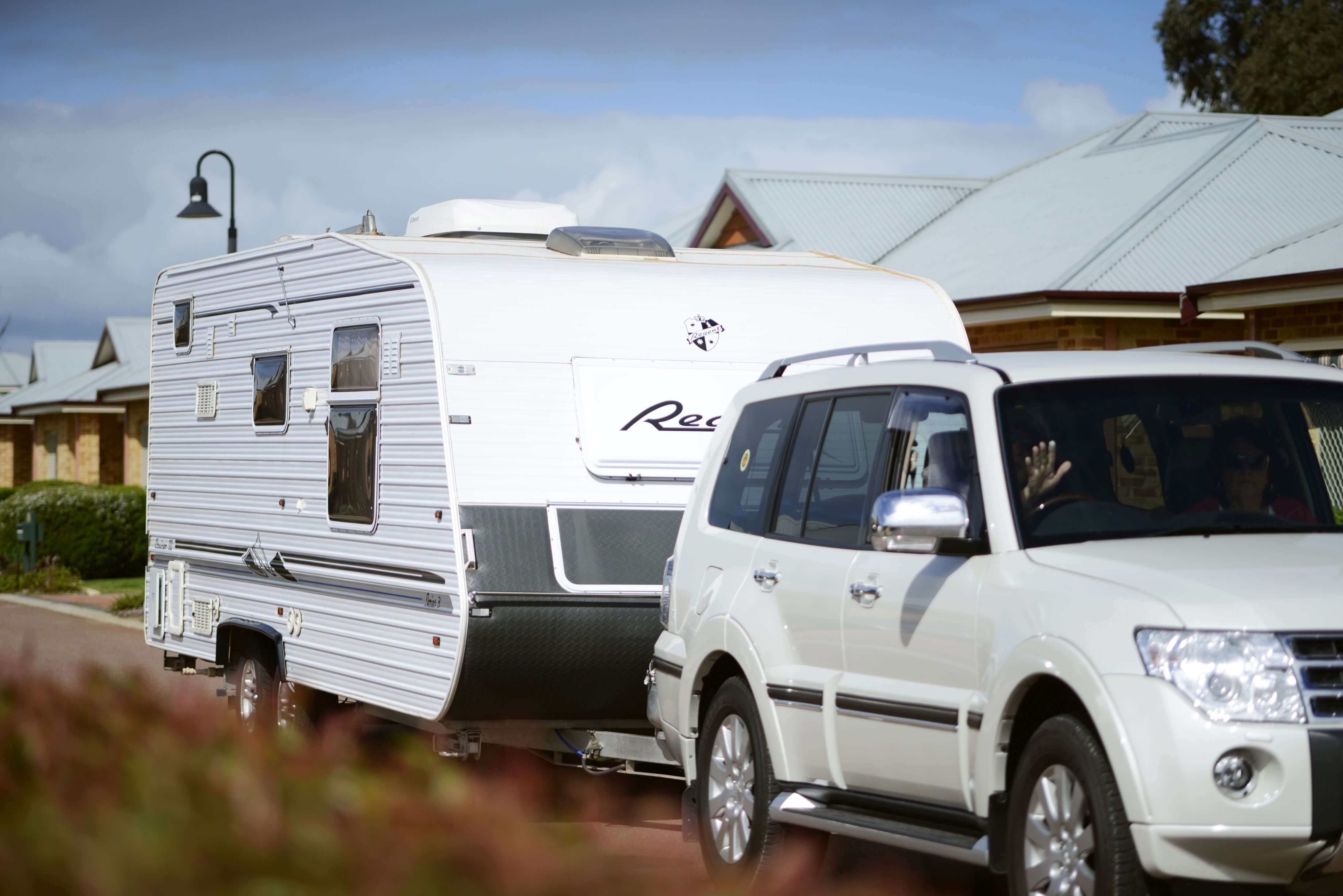 Lock-and-leave lifestyle at St Ives - four-wheel-drive heading off towing caravan behind