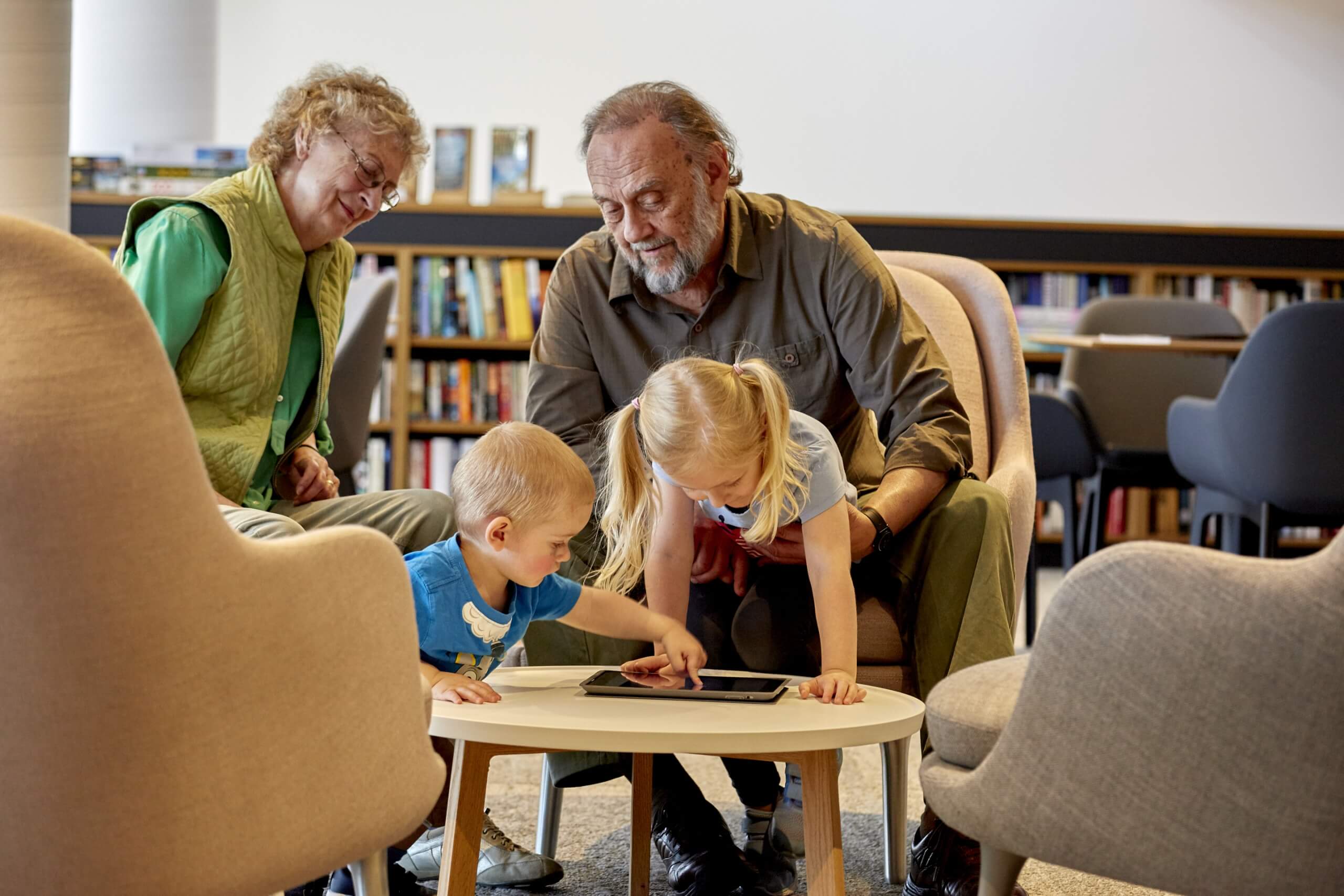 Grandparents playing with their grandchildren
